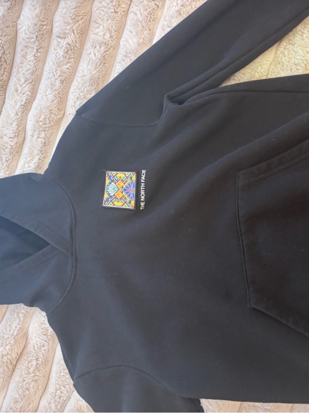 The North Face Black Hoodie with Multicolor Chest Patch